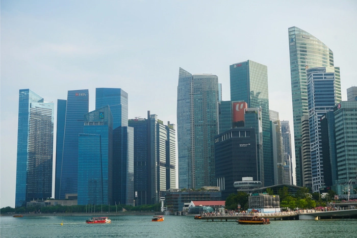 新加坡金管局维持汇率政策框架  适度下调升值步伐应对经济放缓 新加坡金管局维持汇率政策框架  适度下调升值步伐应对经济放缓